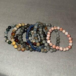 #22 set of assortment of beaded bracelets